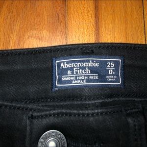 black ripped jean shorts